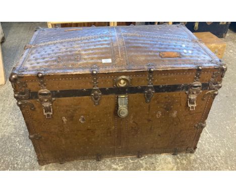 Vintage leather finish and metal banded dome topped steamer trunk marked 'Colonial House Montreal, Canada'. (B.P. 21% + VAT)8