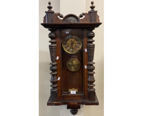 Early 20th century walnut two train Vienna type wall clock with key and pendulum.  (B.P. 21% + VAT) 