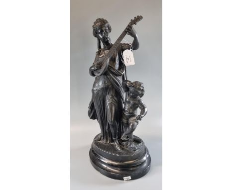 Painted spelter figure group of a lady musician with dancing child. 44inches high approx. On Socle base. (B.P. 21% + VAT)The 