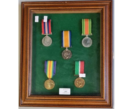 A mixed group of First and Second World War British war medals to include: First World War Victory medal awarded to 111294 dr