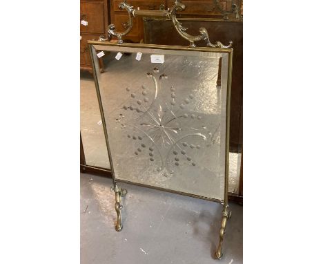 Arts and Crafts design brass framed mirrored fire screen with fluted handle.  (B.P. 21% + VAT) 