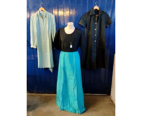 Four vintage ladies fashion silk items to include: a slubbed silk pale green tunic, a black shirt dress, a silk short sleeve 