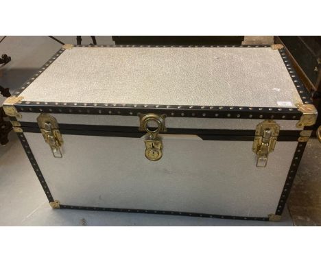 Vintage canvas and metal banded steamer type trunk of rectangular form. (B.P. 21% + VAT)