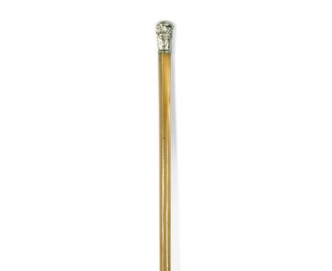 A silver coloured metal handled rhino horn walking stick, circa 1900,  the handle engraved with figures in a garden86cm longN