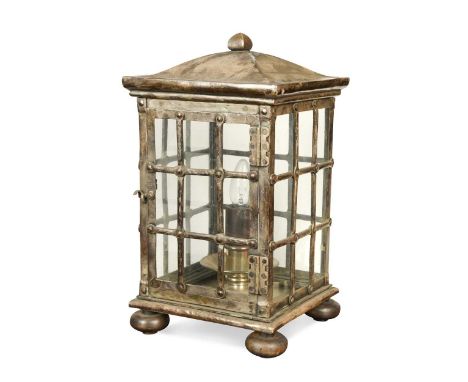 An electroplate table lantern in the Arts & Crafts style, modern, the dome flared top above grilled side panels housing a sin