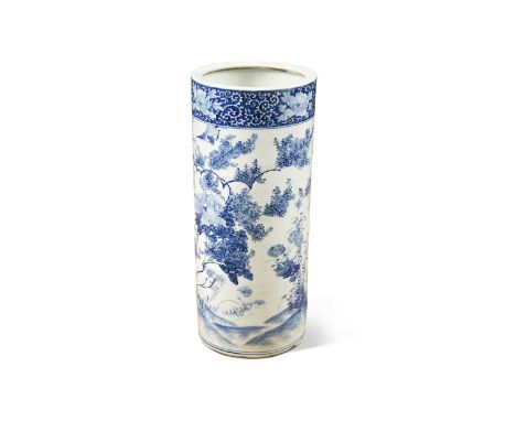 A Chinese blue and white ceramic stick stand, late 19th century,  of cylindrical form decorated with birds, peonies and other