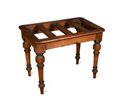 A Victorian mahogany luggage stand, the rectangular slatted top raised on turned tapering legs48 x 63 x 42cmExcellent conditi