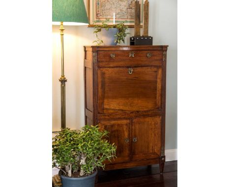 A French walnut and gilt metal mounted secretaire abattant, early 19th century, the frieze drawer above a fall front enclosin