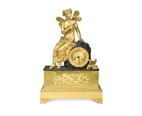 A French Empire gilt metal mantel clock, 19th century,  modelled as Psyche perched upon a rock housing the gilt dial with dru
