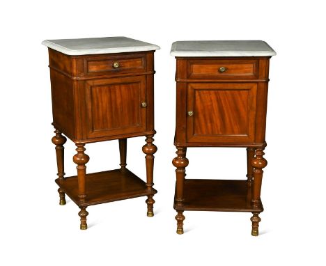 A pair of French marble topped mahogany bedside cabinets, 20th century, both with a single drawer over a cupboard door raised
