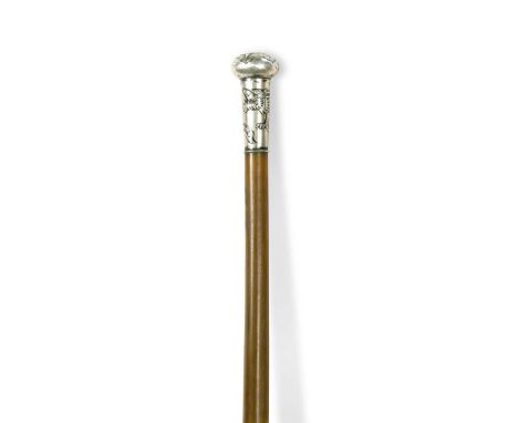 A small silver mounted rhino horn walking stick, circa 1915,  the handle cast with a dragon61cm longNon-UK bidders are polite