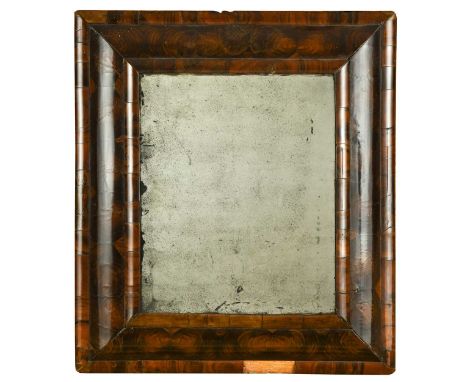A William & Mary olive wood oyster veneer cushion mirror, with bevelled plate60 x 52cm