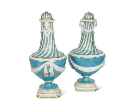 A pair of Chelsea-Derby turquoise ground vases and covers, circa 1775-80, in the neo-classical style, moulded with drapery sw