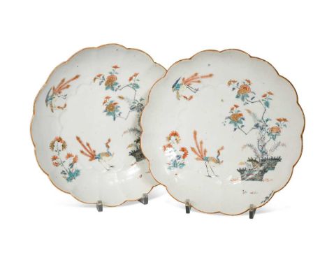 A pair of Chelsea bowls with fluted shaped rims, circa 1754-55, painted in Kakiemon style with two long-tailed birds beside b