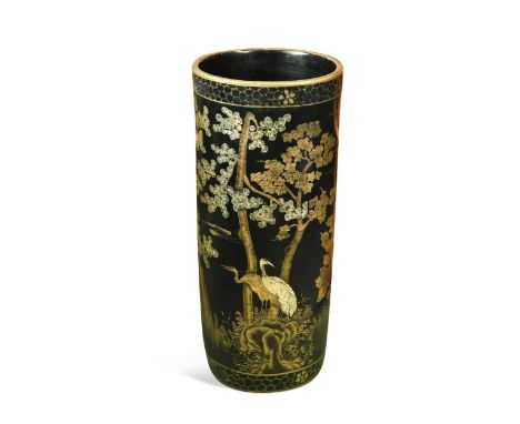 A Japanese black and gilt decorated stick stand, of cylindrical form, decorated with cranes in a woodland64 x 29cm