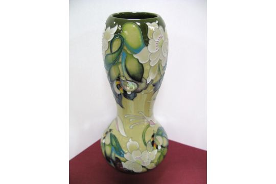 A Moorcroft Pottery Vase In The Honeywort Design By Emma Bossons