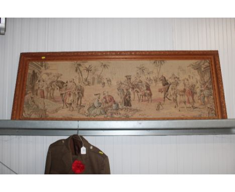 A framed tapestry 