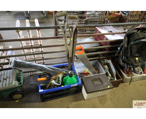 A quantity of garden and workshop tools to include digging forks, spades, various fasteners and fixings and a plastic tool bo