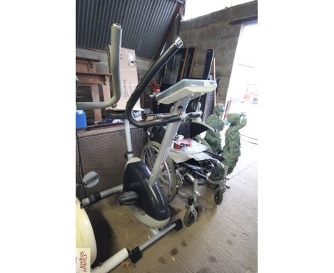 An Olympus Sport magnetic upright cycle exercise machine (with instruction manual)