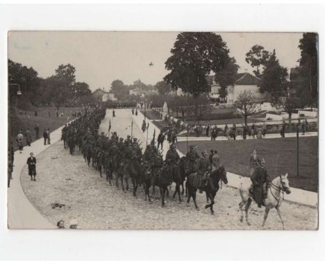 Photo of postcard size, showing Polish Army Cavalry on a Rossa graveyard in Wilno Poland (now Vilnius) during the funeral of 