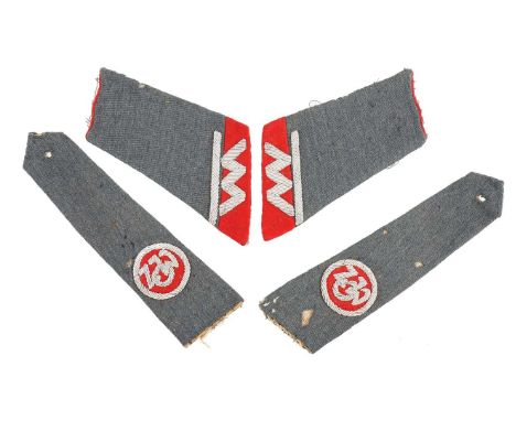 A set of insignia from a uniform in the form of shoulder boards and collar patches of the Związek Ochotników Wojennych (Union