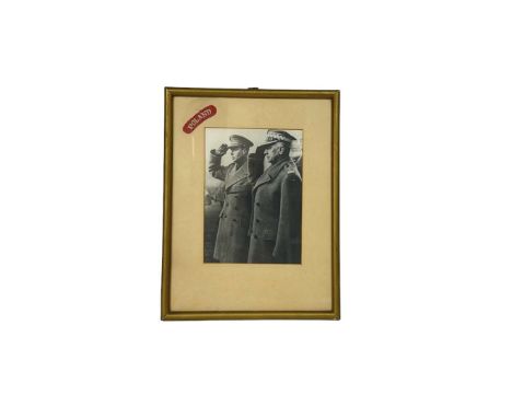 Framed photo, picturing saluting gen. Sikorski next to King George VI. Photo in passepartout, on which POLAND title patch was