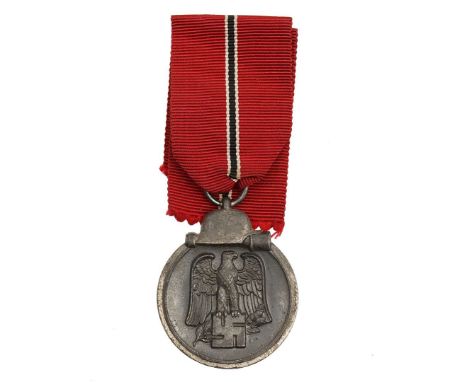 A World War 2 period German Eastern Front Medal - Ostmedallie, 88 (Werner Rado). Good condition with ribbon. &nbsp;size 35mm 