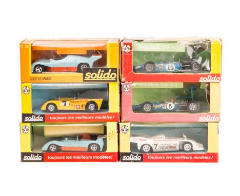 6 1970’s Solido racing cars. Lola T280 No.15 in yellow RN7. Gulf Mirage No.17 in light blue/orange livery, decals unused. Por