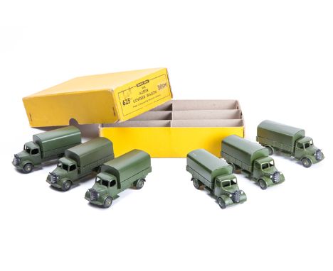 A rare U.S. issue Dinky Toys trade pack of 6 Austin Covered Wagons (30SM). Complete with 6 army vehicles with tilts, in satin