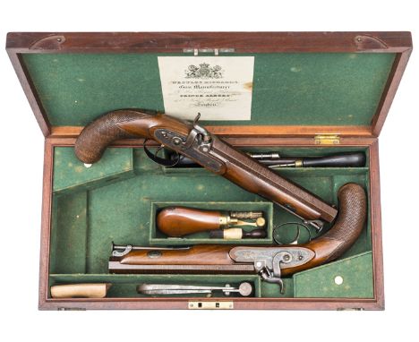 An extremely fine pair of officer’s cased 16  bore percussion belt pistols by Westley Richards, 13” overall, the browned twis