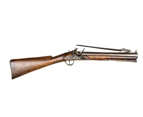 A steel barrelled flintlock blunderbuss with spring bayonet, by Theops. Richards, c 1800, 30” overall, the plain swamped barr