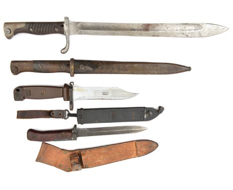 A WWII Mauser K98 bayonet,  in its scabbard; a “Butcher” bayonet by Horster Solingen; also 2 post WWII assault rifle bayonets