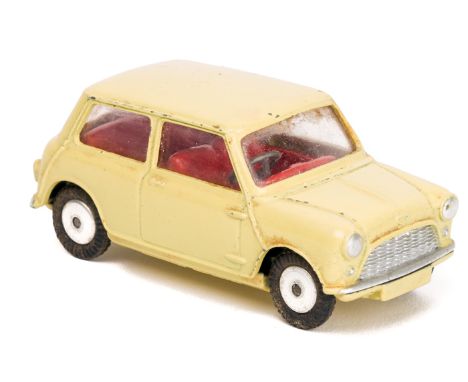 Corgi Toys Austin 7 Mini. An example in lemon yellow with red interior. GC some light chipping. Plate 1 