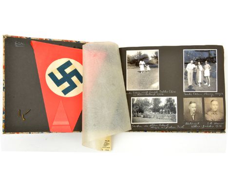 A Third Reich photograph album, covering the period 1936-38, 192 photos, some military. Front cover bearing applied D.A.K tro