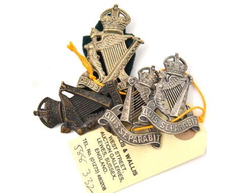 2 R Irish Rifles cap  badges, WM and blackened, and a pair officers similar size collars. GC to VGC (4) Part II of a Private 