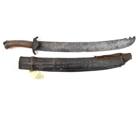 A 17th century hunting cutlass,  17¼” SE curved broad blade with decoratively clipped back tip, staghorn hilt with shell type