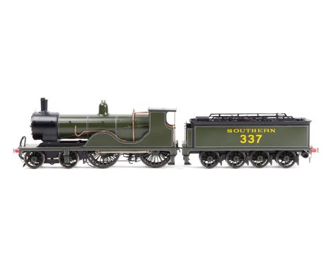 An O gauge fine scale Ex LSWR class T9    4-4-0 tender locomotive. RN337 in Southern lined olive green livery. With an 8-whee