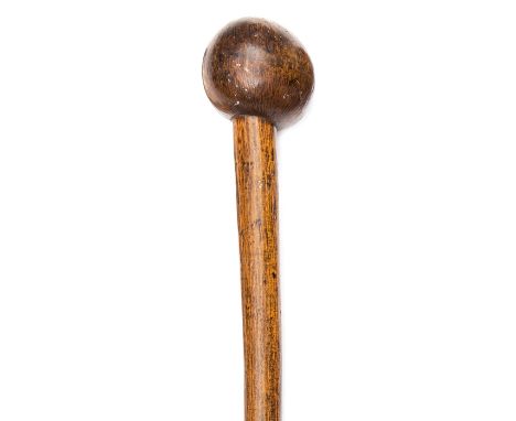 A Zulu walking stick/knobkerry, of polished light brown wood, the stout stem of slightly tapered form, near spherical head, 3