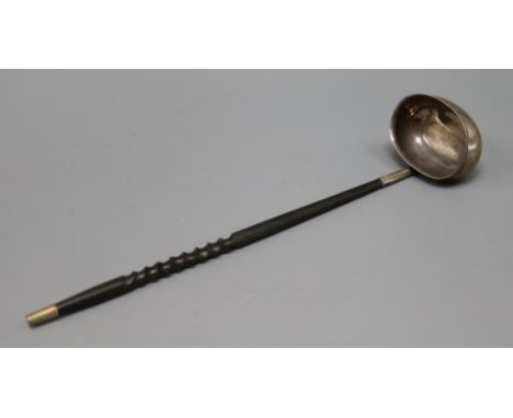 A modern Irish silver punch ladle, with baleen? handle, William Egan &amp; Sons, Dublin, 1980, 31cm.