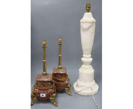 An alabaster lamp and two others tallest 62cm