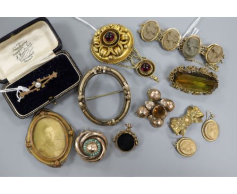 A gilt metal lava bracelet, a pair of similar earrings and sundry items, including a Victorian gilt metal pendant target broo