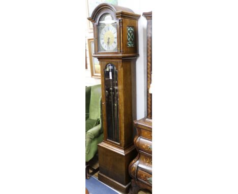 A mid 20th century oak thirty hour longcase clock, the dial signed Canham, London H.199cm