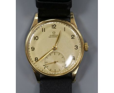 A gentleman's 1940's 14ct gold Omega manual wind wrist watch.