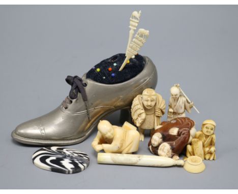 A group of Oriental ivory and bone netsuke, carvings etc and a pewter 'shoe' pin cushion