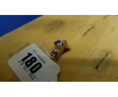 A 14ct gold sapphire and diamond ring