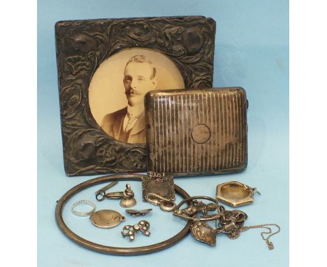 A silver hinged torq, a silver cigarette case a photograph frame (a/f) and other items.