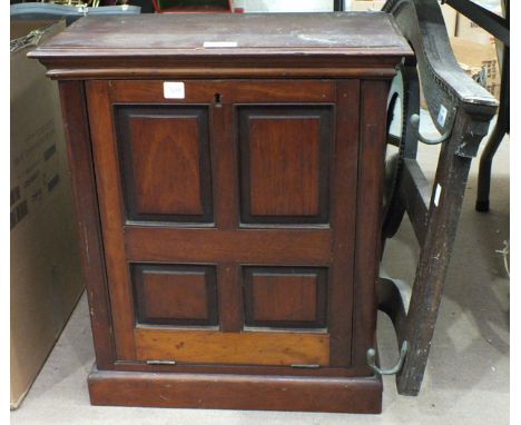A walnut panelled cupboard with fitted interior and drop-down front and an oak coat rack with central mirror, (2).
