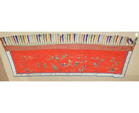 A Chinese embroidered panel of figures in a landscape, embroidered in coloured silks on red ground with one fringed edge and 