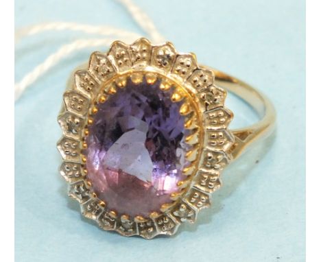 An amethyst ring, the opal amethyst within diamond-point-set border on 9ct gold mount, 4.5g.