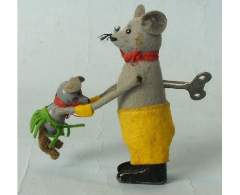 Schuco, a German tinplate clockwork Hopsa Mouse with Baby Mouse, grey felt head and body, yellow felt trousers, red neck tie,
